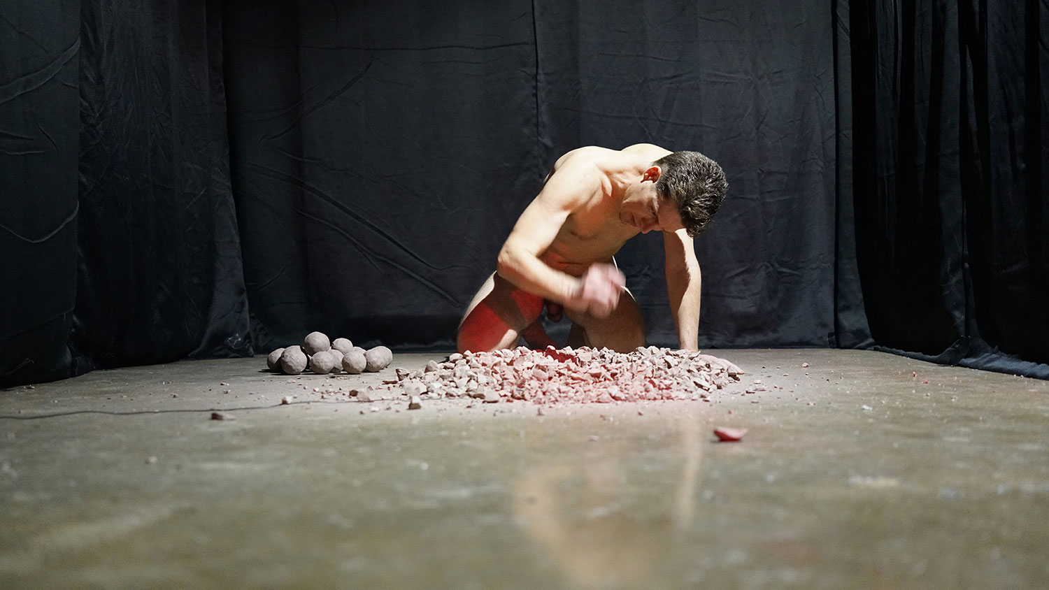 Ball Breaker, 2019, live performance at Experimental Action Festival<br><br>Go to menu, click VIDEOS, to watch excerpts<br><br>I break 100 ceramic balls (100 for its connotation: self-determination, independence, and infinite potential).
