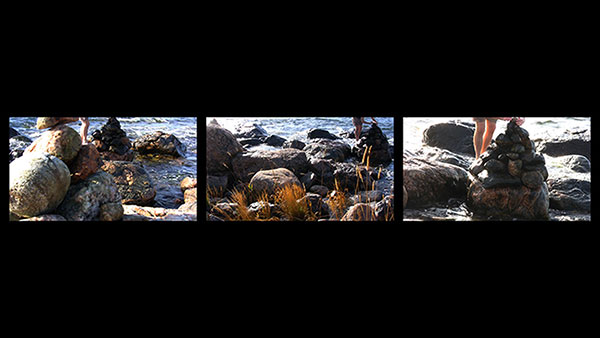 Building Tolerance, 2010, video still, three-channel split screen<br><br>Set in the Gulf of Bothnia, nature’s entropy presages the eventual topple of the cairns.