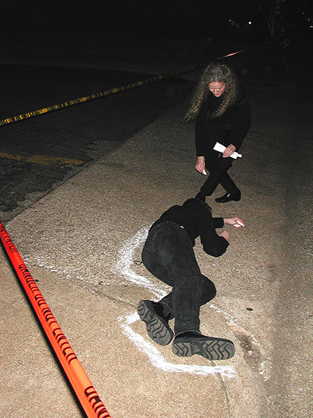 First Night, 2003, live performance<br><br>On February 1, 2003, the Columbia space shuttle exploded above Texas. That night in Nacogdoches, for each of the seven astronauts, we chalked a silhouette and then recited from Jean-Paul Sartre’s Essays in Existentialism, When we say that man chooses his own self, we mean that every one of us does likewise; but we also mean by that in making this choice he also chooses all men.
