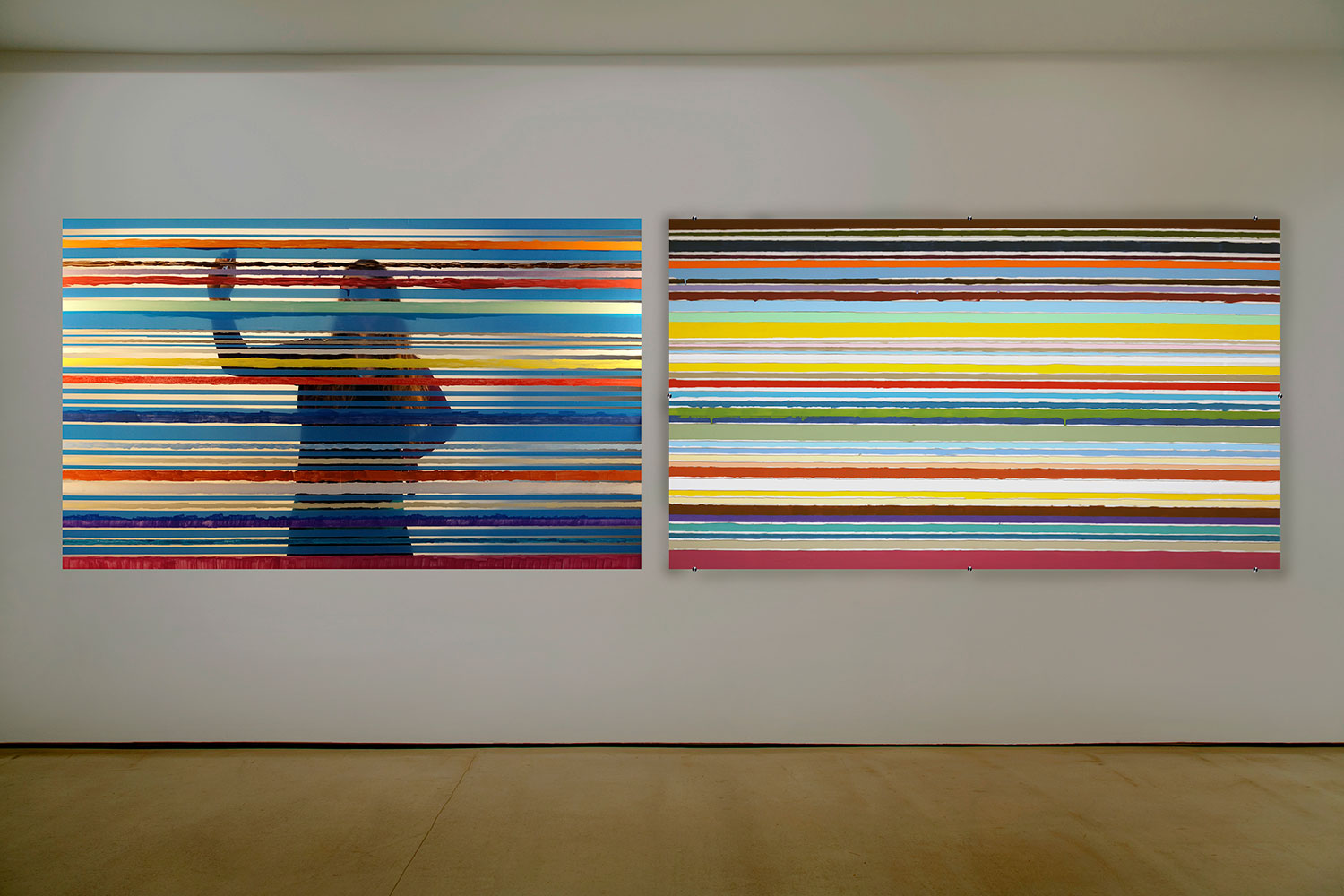 New Day, 2020, installation view, video, acrylic on acrylic, 66 x 38.5<br><br>Kenneth Noland's painting transforms into a social experience. Viewers apply the 41 color stripes onto the off white background.