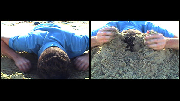 Six of One – Half a Dozen of Another, 2007, video stills, two-channel<br><br>Go to menu, click VIDEOS, to watch excerpts<br><br>Extending the boundaries of the picture plane, I dig at the edge of the frame to escape view. While in the alternate act of covering my head from view, the accumulation of the sand from the piling spills off of the frame.