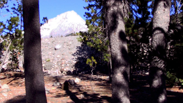 Total Eclipse, 2020, video still<br><br>Go to menu, click VIDEOS, to watch excerpts<br><br>Very good indicators of climate change, most glaciers have shrunk by 50 percent over the last 100 years. Shown, Mt. Hood, Oregon