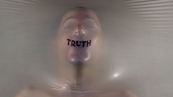 Truth Comes Out, 2022, video still<br><br>Go to menu, click VIDEOS, to watch excerpts<br><br>Truth comes out.